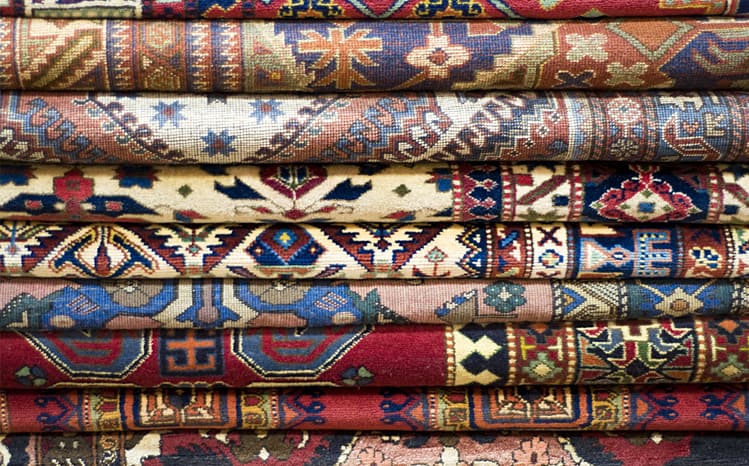 Stack of Persian Rugs