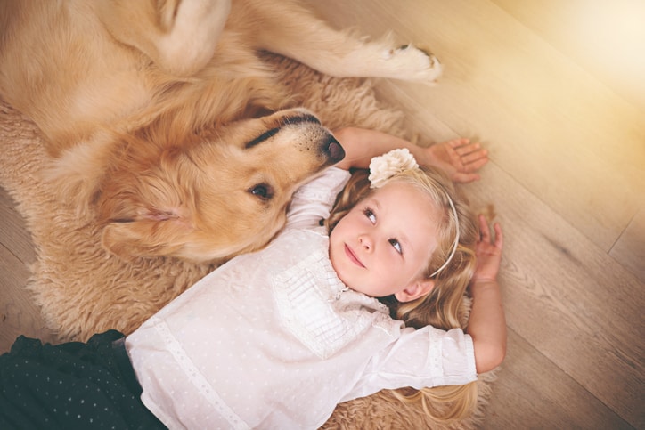 rug with dog and kid