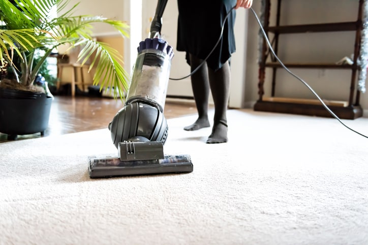 vacuuming rug